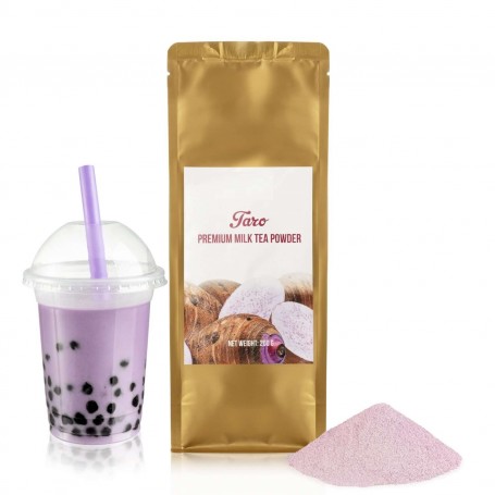 The bag of taro instant tea for Bubble Tea. On the side there is a cup full of pink Bubble Tea.